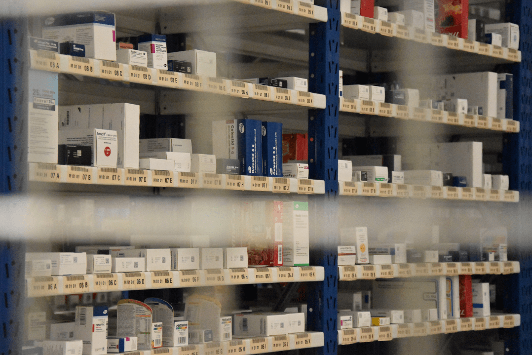 Medicines stored in a shelf.