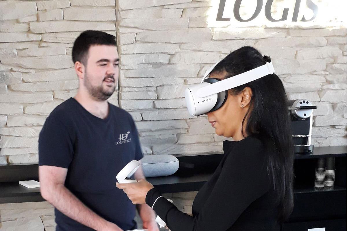 Photo of ID Logistics employees testing VR training.