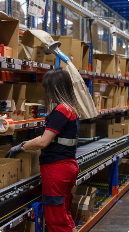 ID Logistics employee preparing orders.